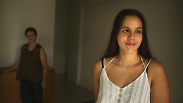Jas, 17, with her mother Irena (in background). Jas was clinically obese at nine years old and was diagnosed with polycystic ovarian syndrome four years later.