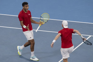 Felix Auger-Aliassime and Denis Shapovalov of Canada celebrate advancing to the final against Spain.