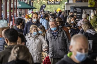 Shoppers with masks at South Melbourne Market yesterday as Melbourne’s COVID-19 restrictions continued. 