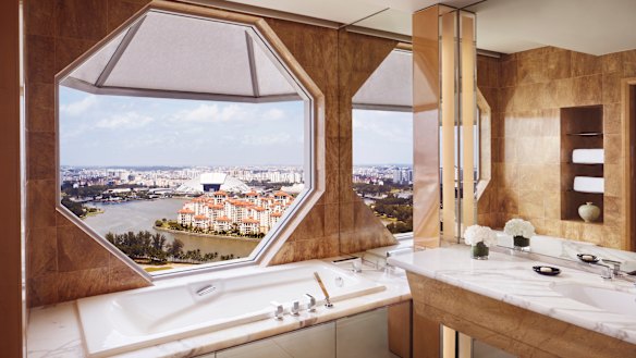 The hotel is renowned for the signature octagonal windows in its extravagant bathrooms.