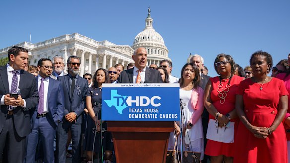 State Representative Chris Turner, chairman of the Texas House Democratic Caucus, and Democratic members of the Texas legislature hold a news conference at the Capitol in Washington.