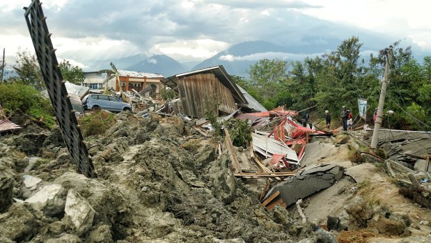 The mud chaos 
left by the broken water embankment in Petobo, a district of Palu.
