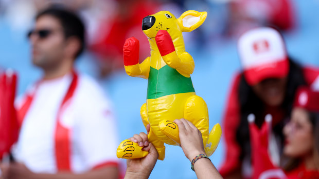 Australia fans hold up an inflatable kangaroo before the World Cup game against Tunisia.