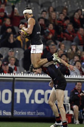 Andrew Walker took to the skies with this famous mark over Jake Carlisle.