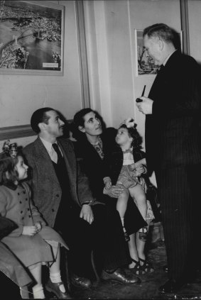 "Mr. Chifley meets migrant family - Isidore Garten, his wife and two children - at Australia House migration centre. April 27, 1949."