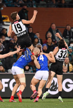 Mitch Georgiades flies for Port Adelaide.