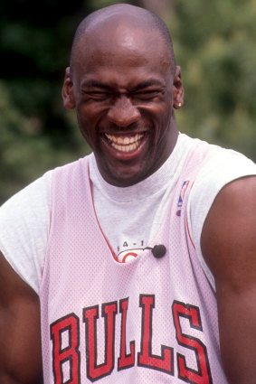 Michael Jordan of the Chicago Bulls laughs during a photo shoot in May, 1992.
