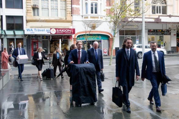 Lawyers arrive at the WA Supreme Court in July, where Hancock Prospecting is defending a royalties claim by Wright Prospecting over the Hope Downs tenement in WA’s Pilbara region.