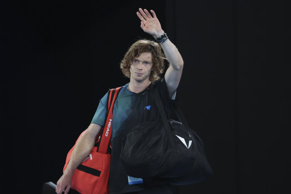 Andrey Rublev of Russia waves as he leaves Rod Laver Arena.