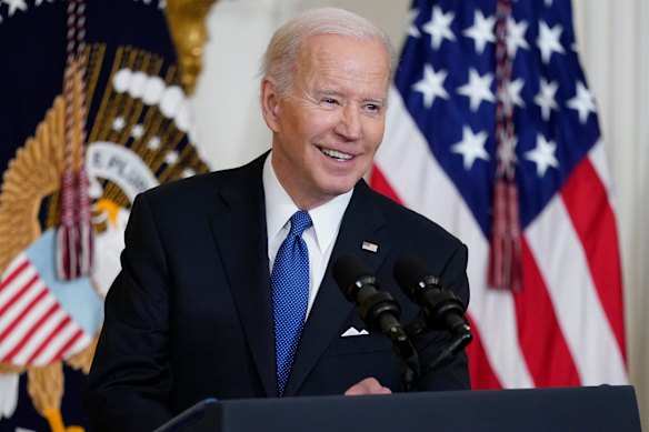 US President Joe Biden speaks during an event about medical care in the East Room of the White House in Washington.