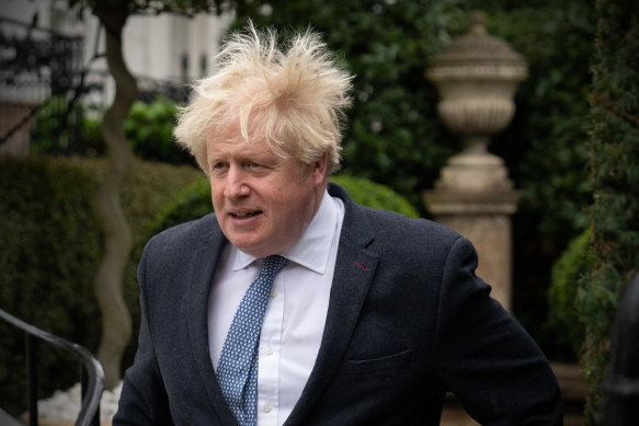 Boris Johnson leaves his home on March 21, 2023.