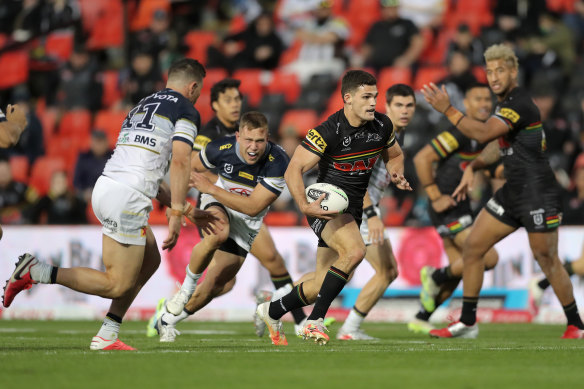 Nathan Cleary bulldozes through North Queensland's defence.