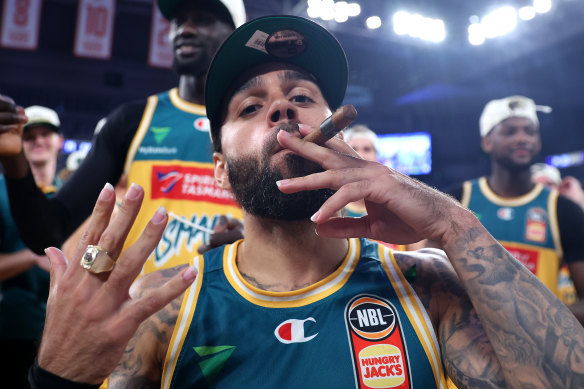 Jordon Crawford celebrates after spearheading the Tasmanian JackJumpers to their upset win over Melbourne United in the five-match final series. 