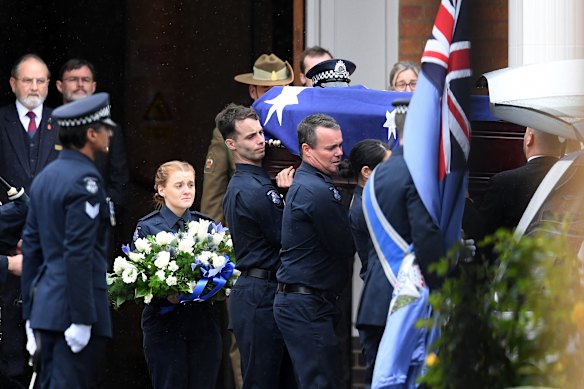 Colleagues serve as pallbearers as Constable Humphris' funeral.