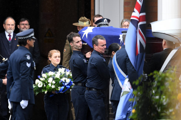Colleagues serve as pallbearers as Constable Humphris' funeral.