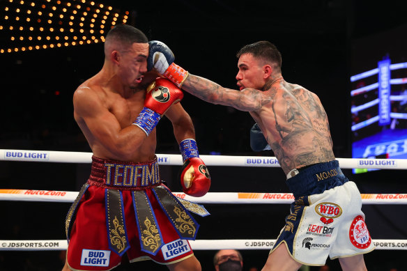 Kambosos in the ring last November with then lightweight champ, American Teófimo López jnr.