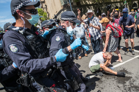 Capsicum spray was used by police on members of the crowd that gathered to protest against the Victorian government's response to COVID-19 and support conspiracy theories about the virus.