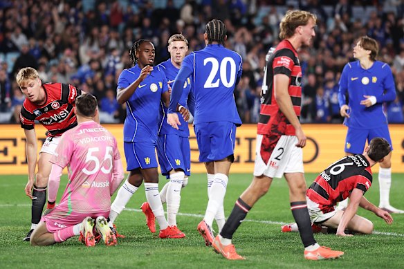 Jamie Gittens of Chelsea celebrates with teammates after scoring a goal against the Western Sydney Wanderers in a pre-season friendly, won 6-4 by the English club.