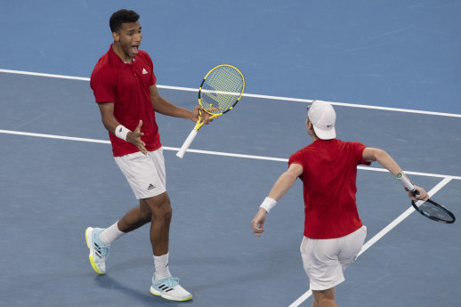 Felix Auger-Aliassime and Denis Shapovalov of Canada celebrate advancing to the final against Spain.