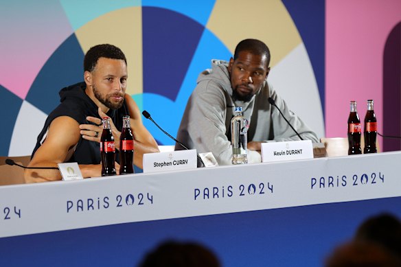 NBA stars Steph Curry and Kevin Durant of the United States speak to media at the Paris Olympics in 2024. 