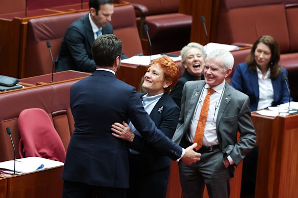 Senator Jonno Duniam is embraced by One Nation leader Senator Pauline Hanson after his speech. 