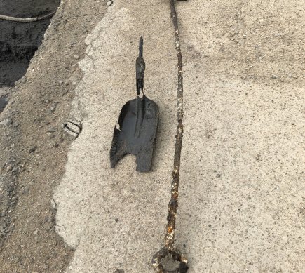 A steam engine fireman’s shovel unearthed at Woolloongabba beside an ashpit uncovered during construction of the new Woolloongabba rail station.