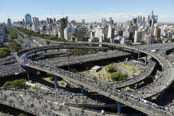 Argentina fans converge on the highways for the homecoming parade.