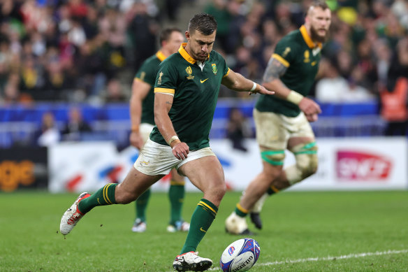 Handre Pollard kicks the winning penalty for South Africa against England from over 50 metres.