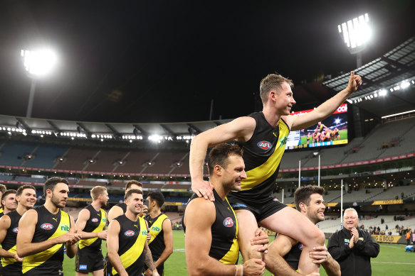 Dylan Grimes is chaired off in game 200.