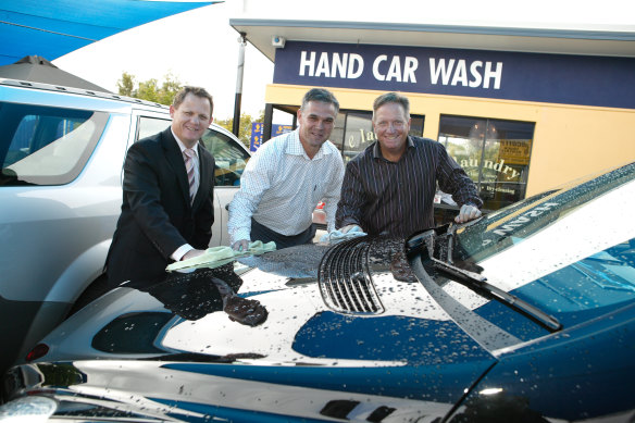 Kevin Walters, Chris Johns and Ian Healy at their car wash in 2005.