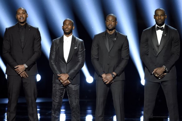 Carmelo Anthony, Chris Paul, Dwyane Wade and LeBron James speak at the ESPY Awards in Los Angeles in 2016.