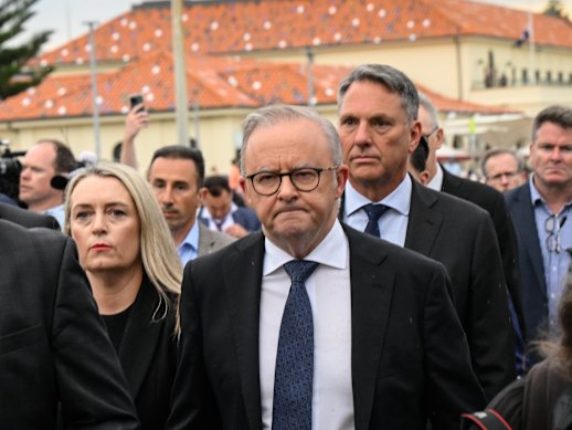Prime Minister Anthony Albanese, his wife Jodie Haydon and Deputy Prime Minister Richard Marles arrive at the memorial service.