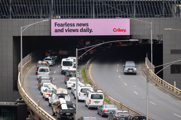 Crikey advertising on an electronic billboard on Kings Way in Melbourne.