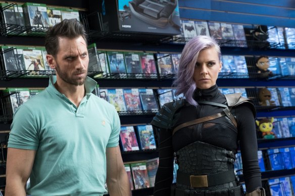 Wolf (Derek Wilson) and Tiger (Eliza Coupe) try to blend in Future Man.