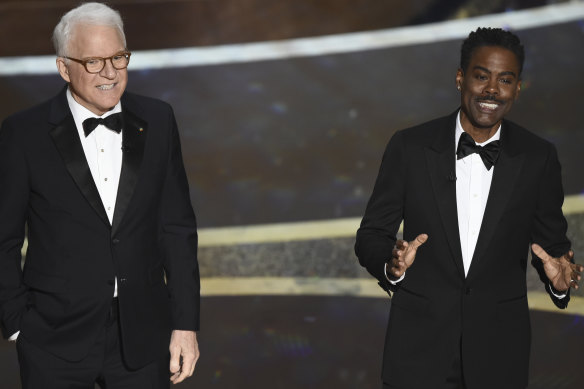 Best non-hosts: Steve Martin, left, and Chris Rock speak at the Oscars.