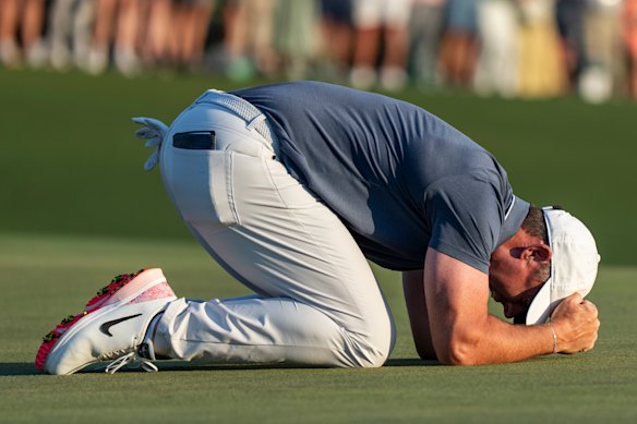 Rory McIlroy on the 18th green after winning the Masters.