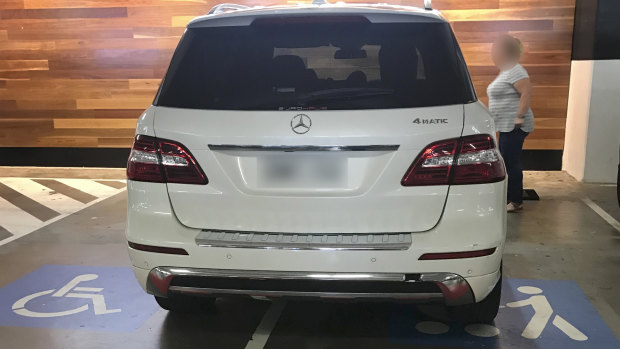A car parked illegally in a Disabled parking space in Homebush.