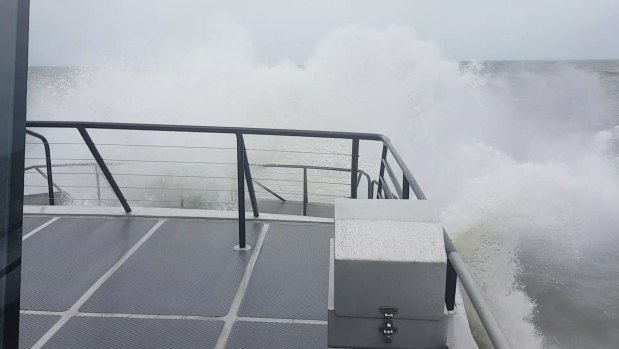The 24-metre Police Vessel Conroy punching through four-metre waves during the search for FV Dianne.
