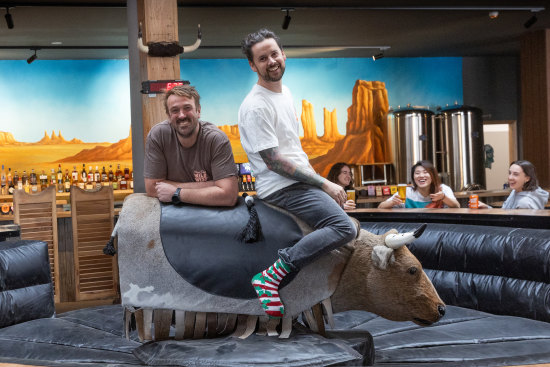 Moon Dog Wild West in Footscray, featuring the mechanical bull ridden by owners Josh Uljans (left) and Karl van Buuren.