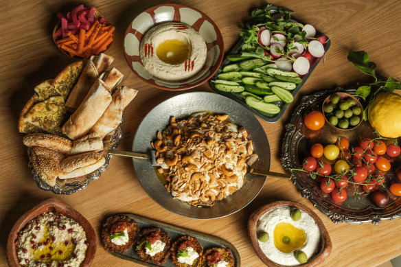 Trout fatteh (centre) and other brunch items from Sarafian’s menu.