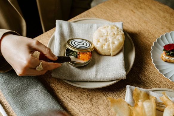 Playful snacks include Circl-branded tins of Yarra Valley Caviar with brown-butter crumpets.