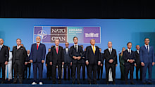 NATO leaders assemble for the traditional “family photo” in Ankara.