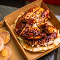 24-hour marinated charcoal chicken with Lebanese pita bread.