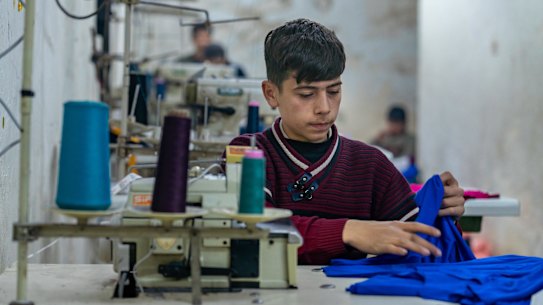 Ahmad works as a tailor in a small pyjama factory in Aleppo, Syria, from 8am to 8pm six days a week.