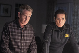 Detective Ralph Anderson (Ben Mendelsohn) and police chief Yunis Sablo (Yul Vazquez) ponder their next move in The Outsider.  