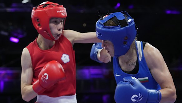 Lin Yu-ting, left, fights Bulgaria’s Svetlana Staneva in their women’s 57kg quarter-final.
