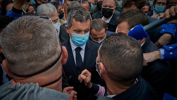 French Interior Minister Gérard Darmanin on the scene.