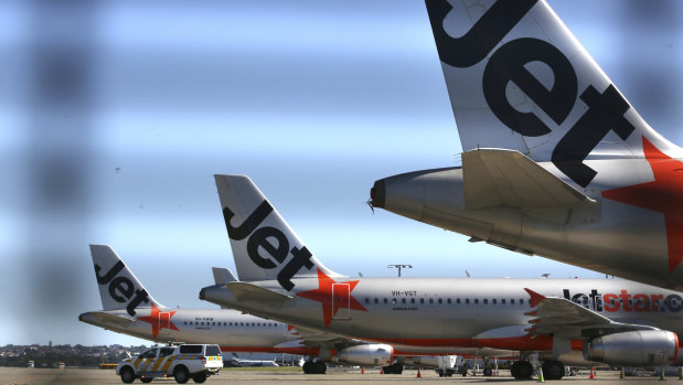 Aircraft sit idle at Sydney Airport, grounded by the coronavirus pandemic.