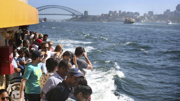 The Narrabeen is packed with day trippers as it sails from Circular Quay to Manly on Sunday.
