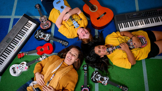 Berwick Lodge Primary School music teacher Lorraine Montgomery with students Genny (long dark hair) and Grace at their music room.